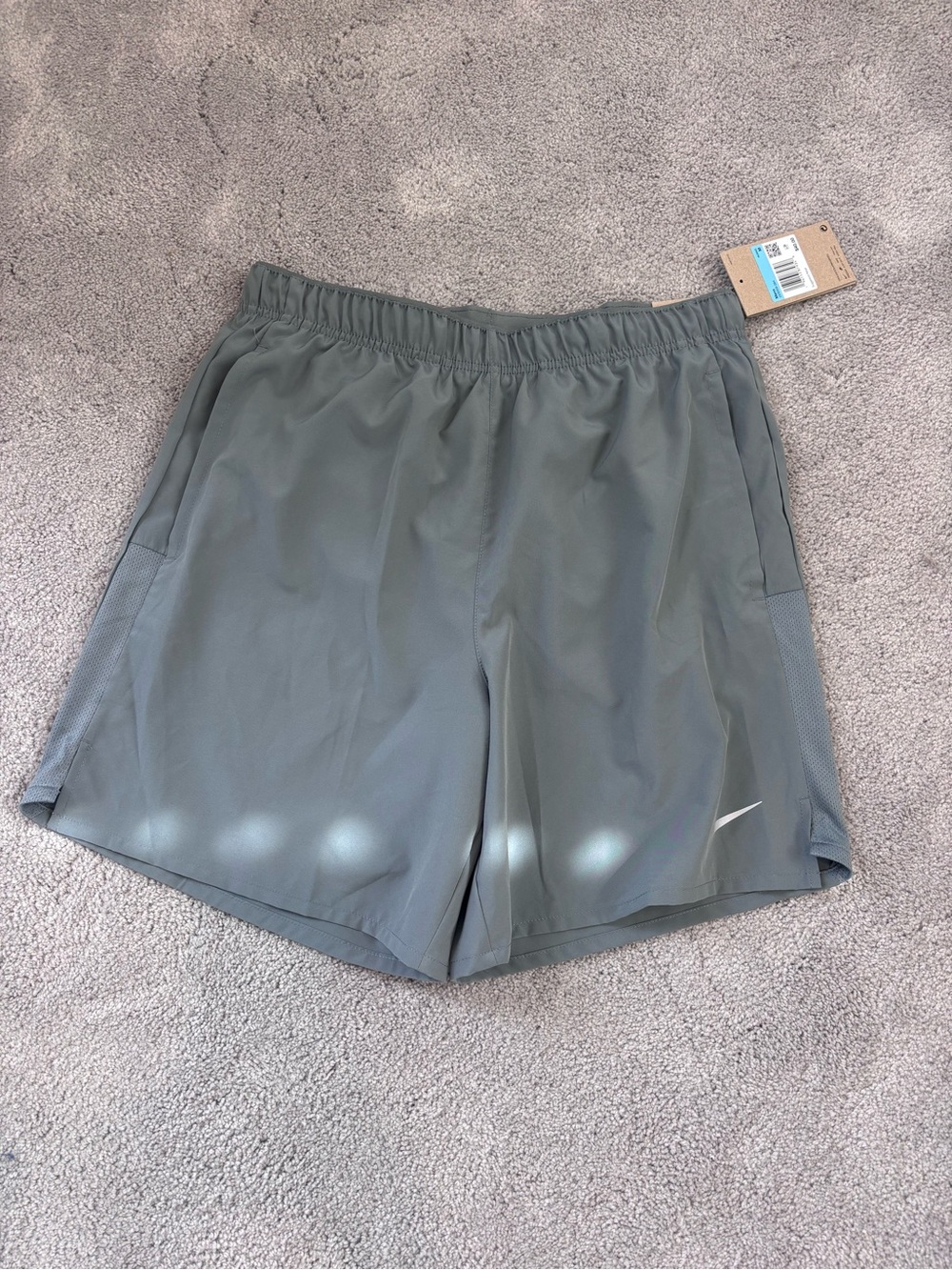 Nike Men's Gray Athletic Shorts with White Swoosh